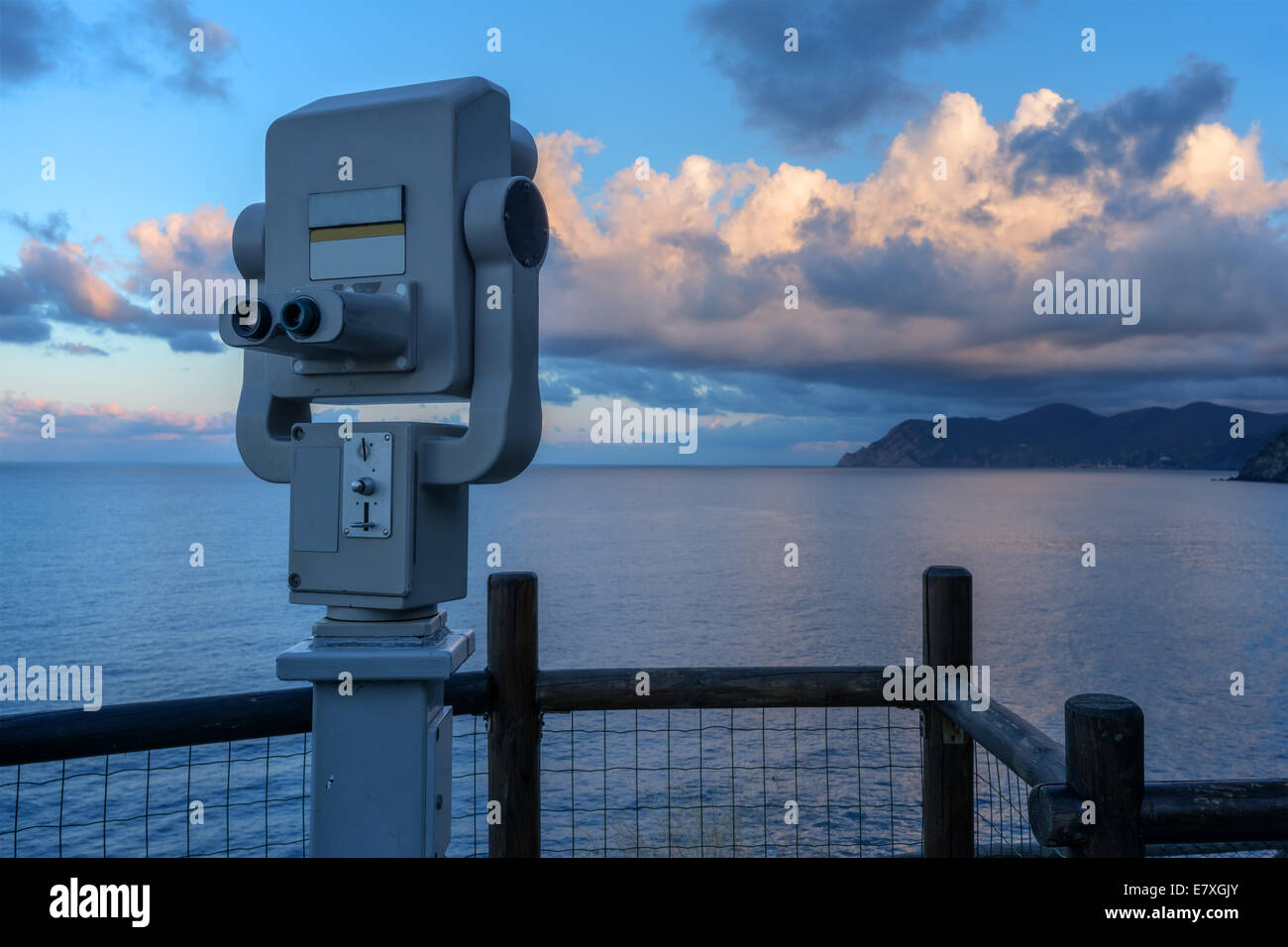 metal telescope on blue sea Stock Photo