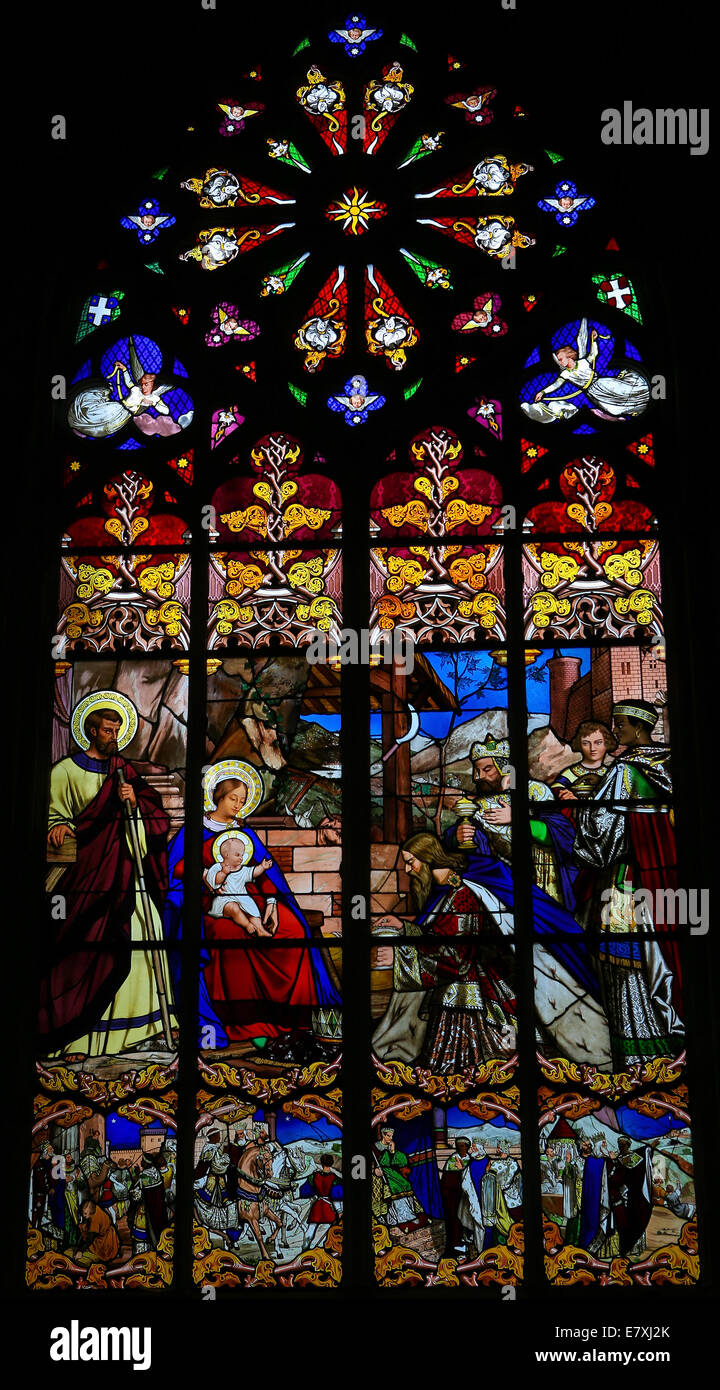 Stained glass window depicting the Epiphany, the Visit of the Three Kings in Bethlehem, in the Cathedral of Tours, France. Stock Photo