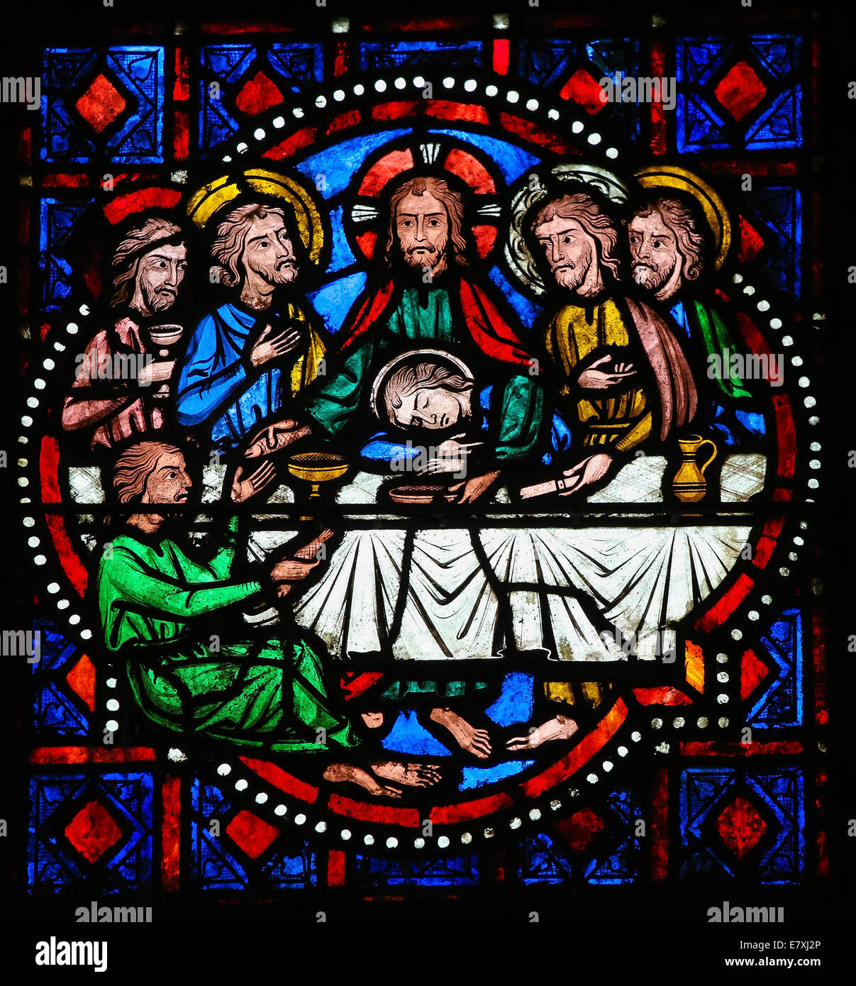 Stained glass window depicting Jesus and the Apostles at the Last Supper on Maundy Thursday in the Cathedral of Tours, France. Stock Photo