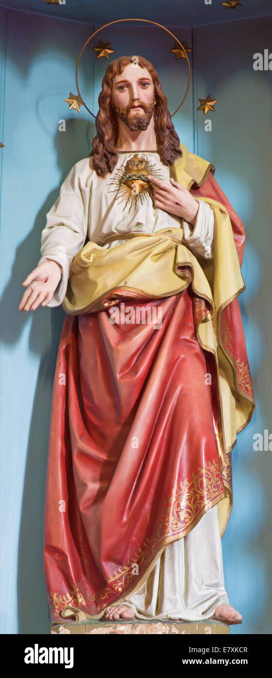 SEBECHLEBY, SLOVAKIA - JULY 27, 2014: The carved statue of Heart of Jesus Christ from 19. cent. Stock Photo