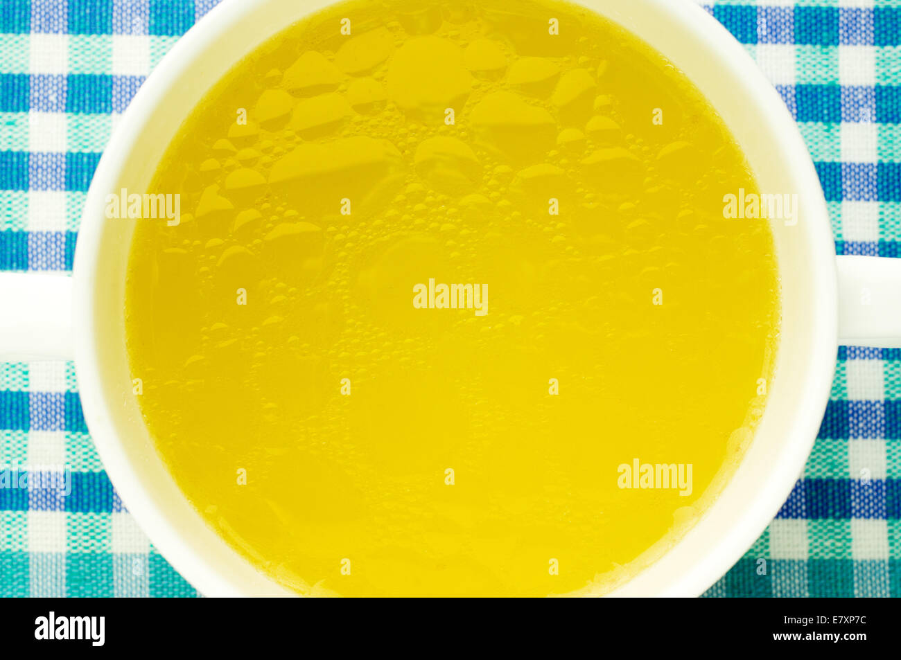 Fat oily broth, bouillon, clear soup closeup Stock Photo Alamy