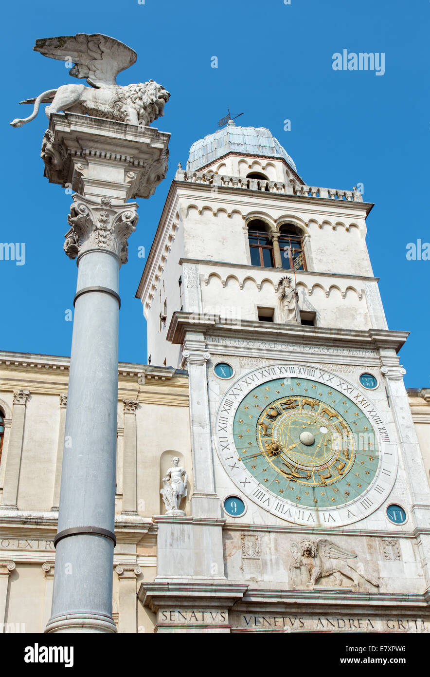 PADUA, ITALY - SEPTEMBER 9, 2014: Piazza dei Signori square and Torre del Orologio (astronomical clock tower) and st. Mark colum Stock Photo