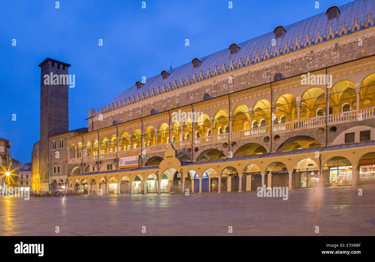 PADUA, ITALY - SEPTEMBER 9, 2014: Piazza della Fruta in evening dusk and Palazzo Ragione. Stock Photo
