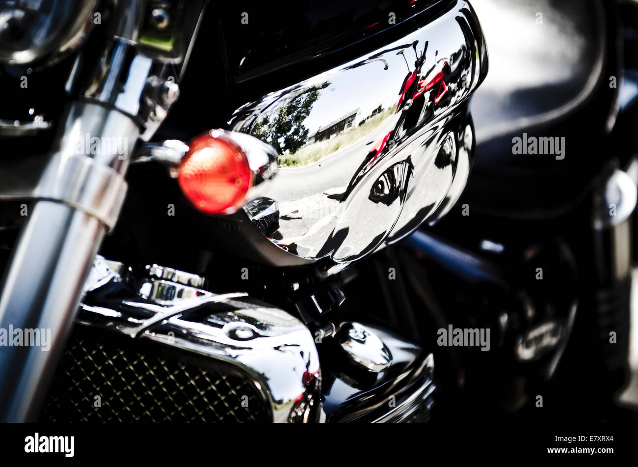 Close up of exhaust pipes and other motor parts of a Motorbike. Stock Photo