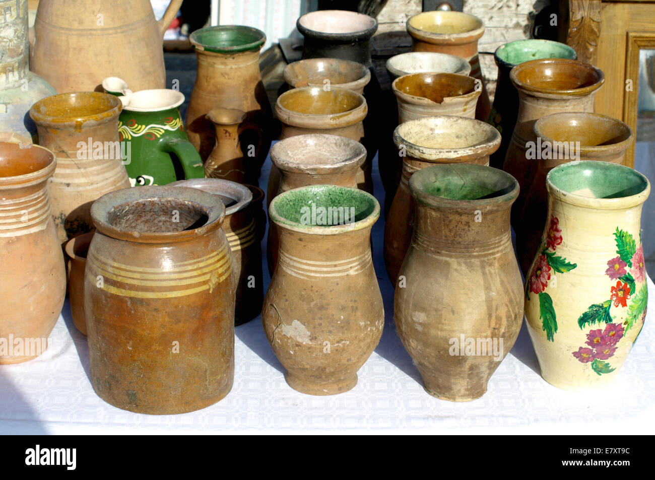 Old jugs for sale at antiques fair Stock Photo