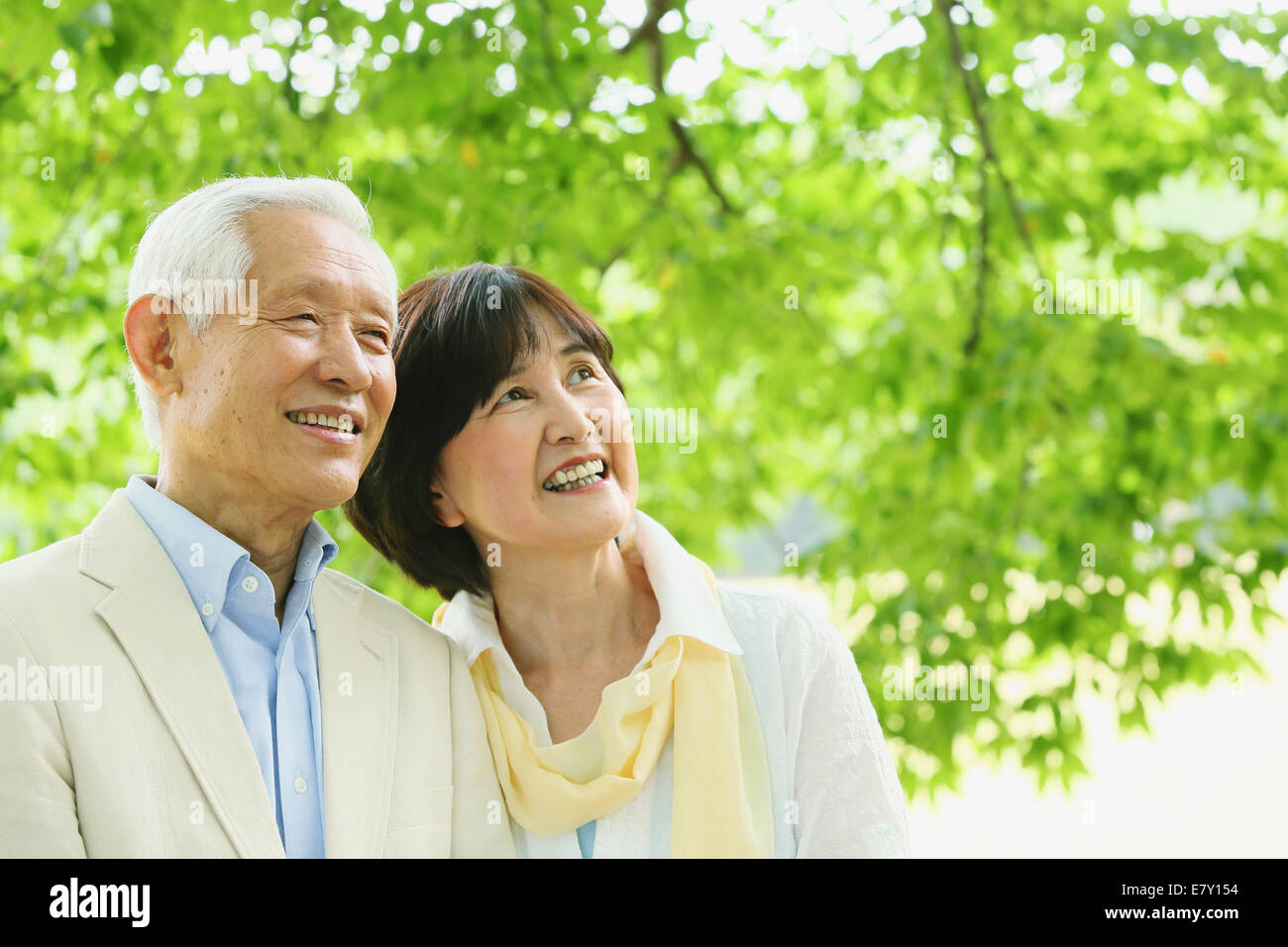 Senior adult Japanese couple in a park Stock Photo - Alamy