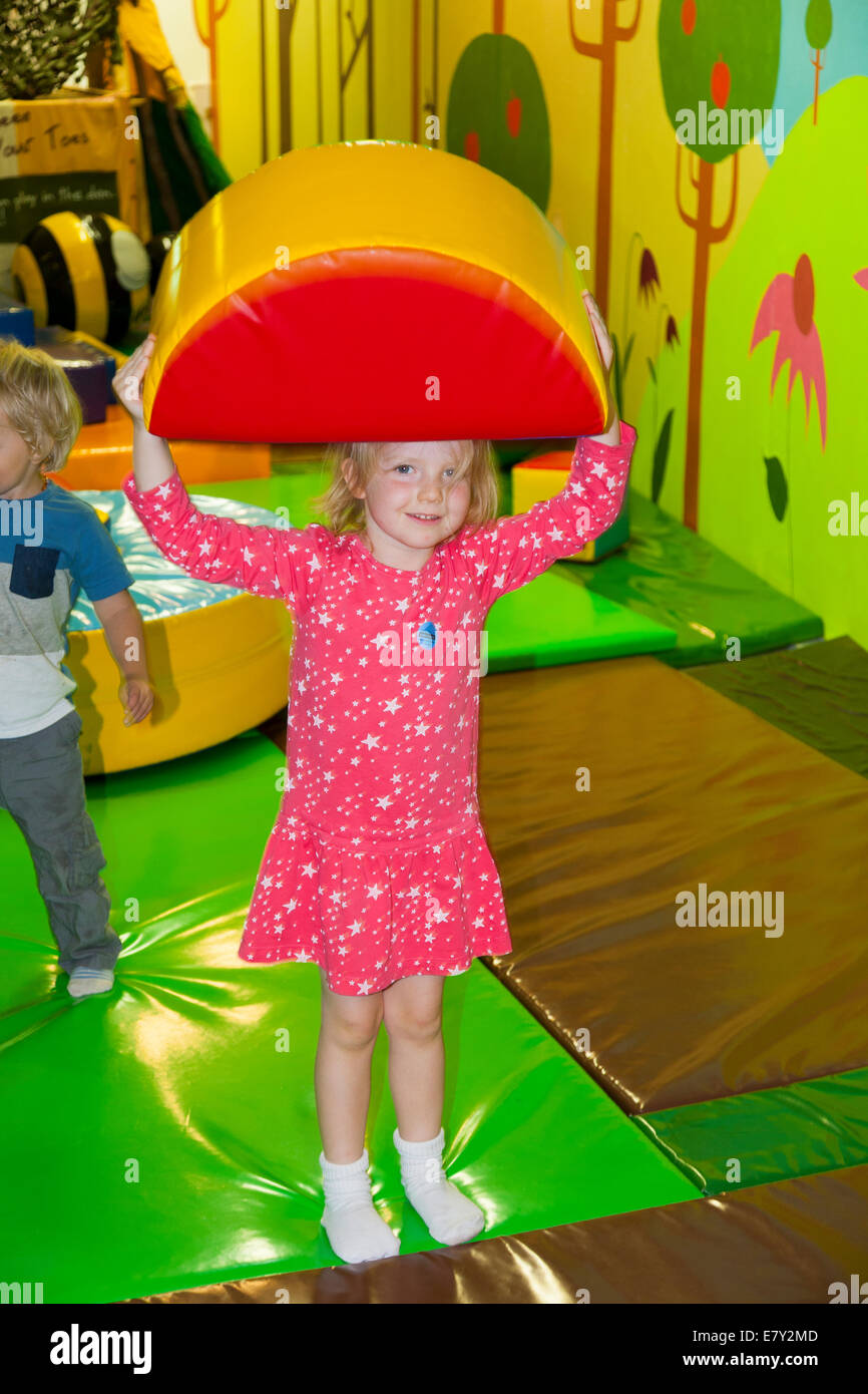 four-4-year-old-girl-child-playing-in-the-soft-play-area-in-the-eden