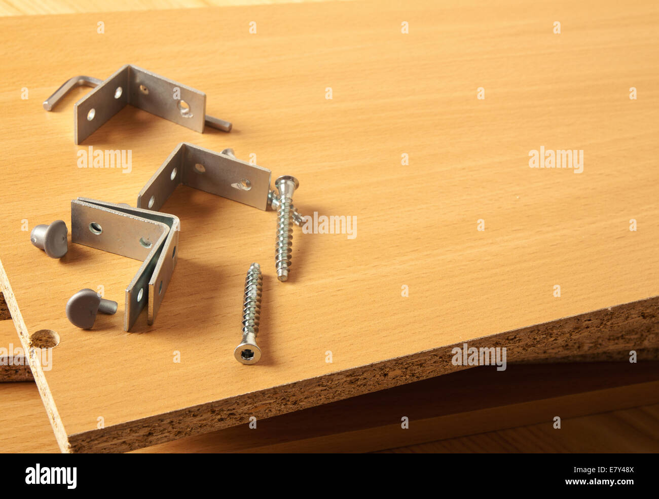 Brown wooden furniture parts for assembly Stock Photo