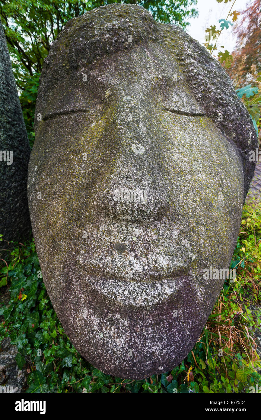 Stone sculpture in the Zurich Botanical Gardens. Already exaggerated, a close-up with wide-angle lens increses the distortion Stock Photo