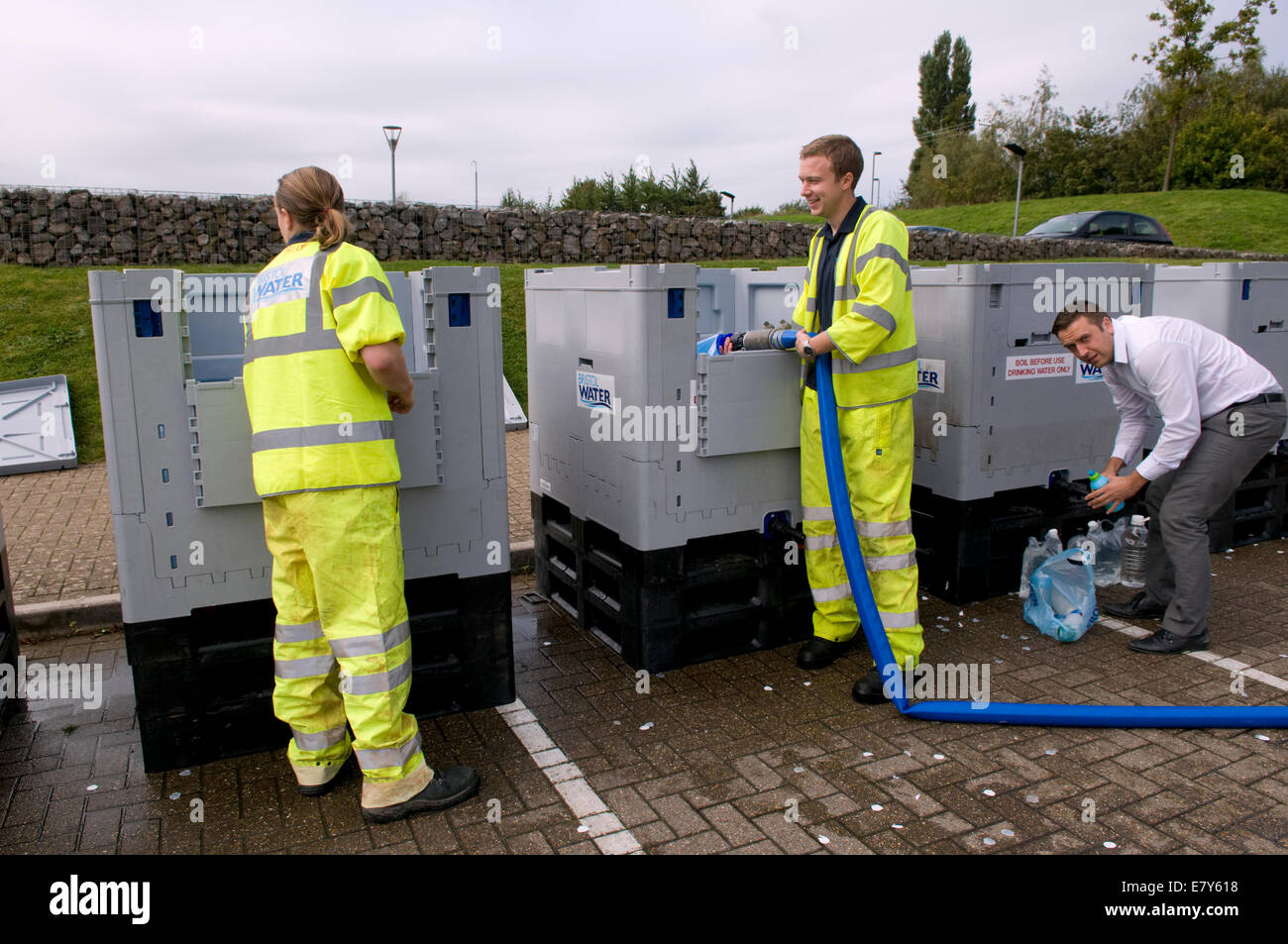 Bristol, UK. 26th Sep, 2014. Bristol water filling water bowsers at Longwell Green, so that local residents can obtain water after being left with no water overnight due to a burst water mains in Fisher Road, Kingswood, Bristol, which is affecting thousands in East Bristol.  Bristol water as yet have no estimated time when service will be restored. Taken 10.30am Sept 26th. Credit:  Rachel Husband/Alamy Live News Stock Photo