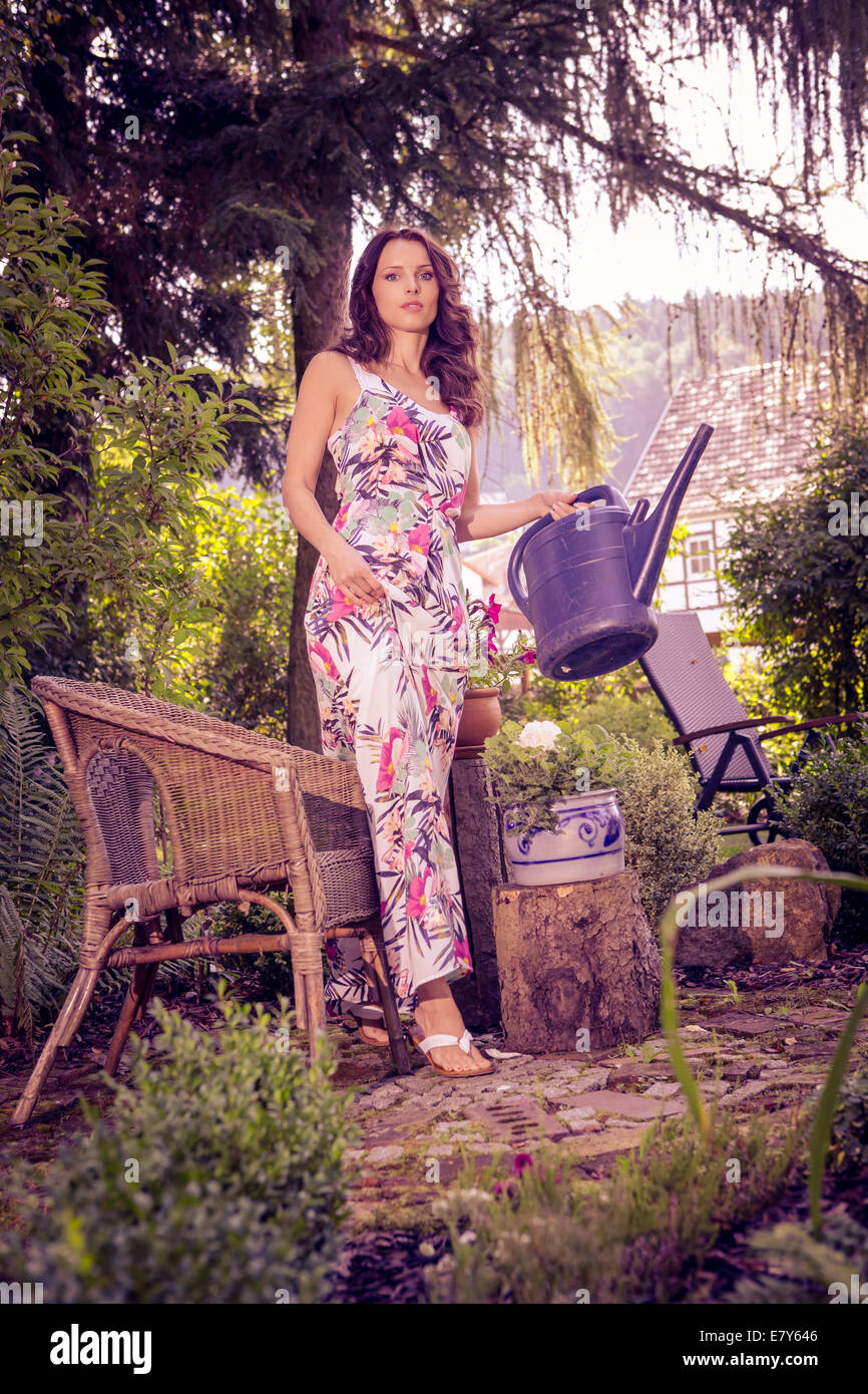 portrait of a young woman in the garden Stock Photo - Alamy