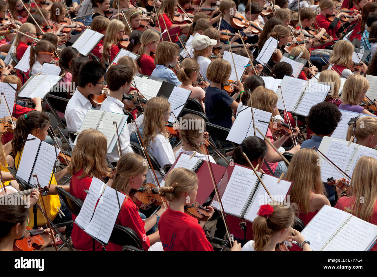 Childrens orchestra playing violins Stock Photo