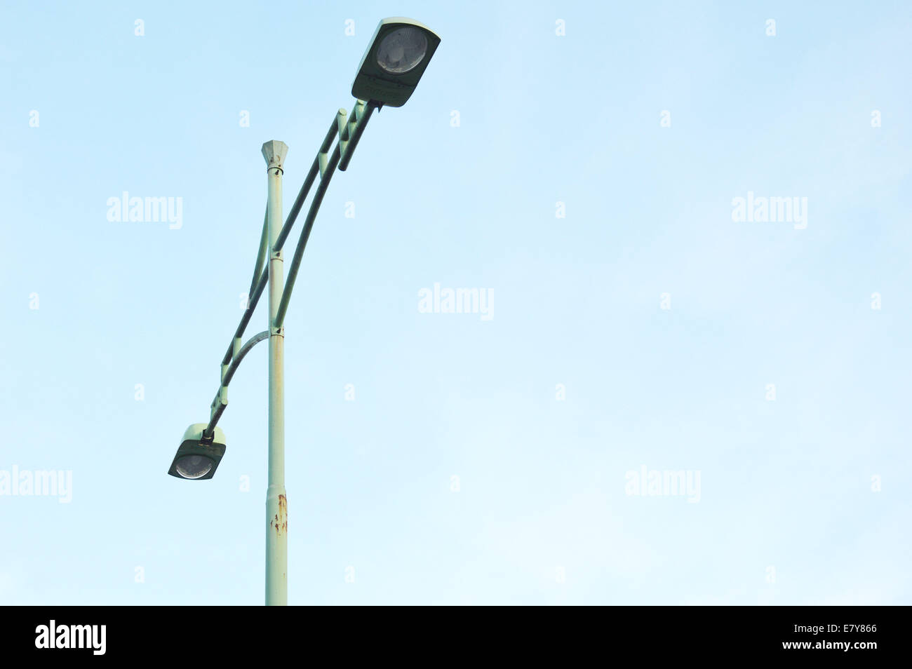 street  light poles with white clouds and blue sky backgrounds Stock Photo