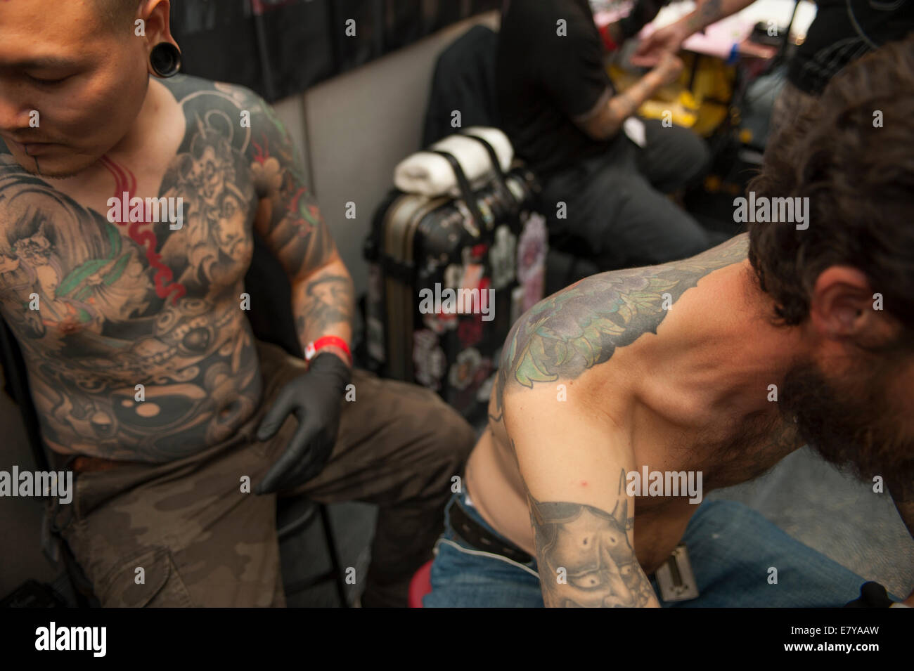 Tobacco Dock, Shadwell, London UK. 26th September 2014. 10th anniversary International London Tattoo Convention runs from 26th-28th September with artists demonstrating their skills. Credit:  Malcolm Park editorial/Alamy Live News. Stock Photo