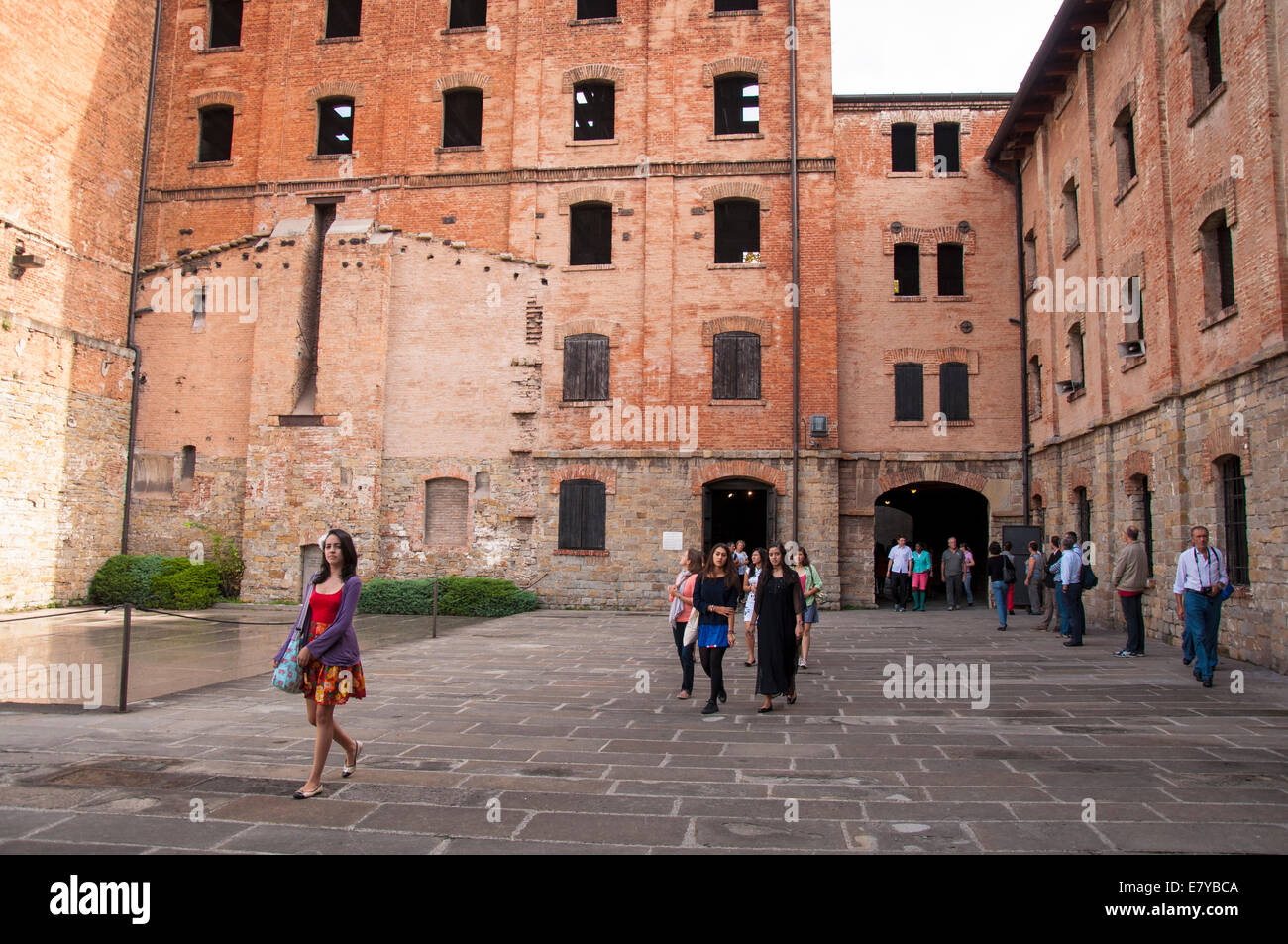 Visitors at Risiera di San Sabba a 5-storey brick-built compound located in Trieste, northern Italy, that functioned during Worl Stock Photo