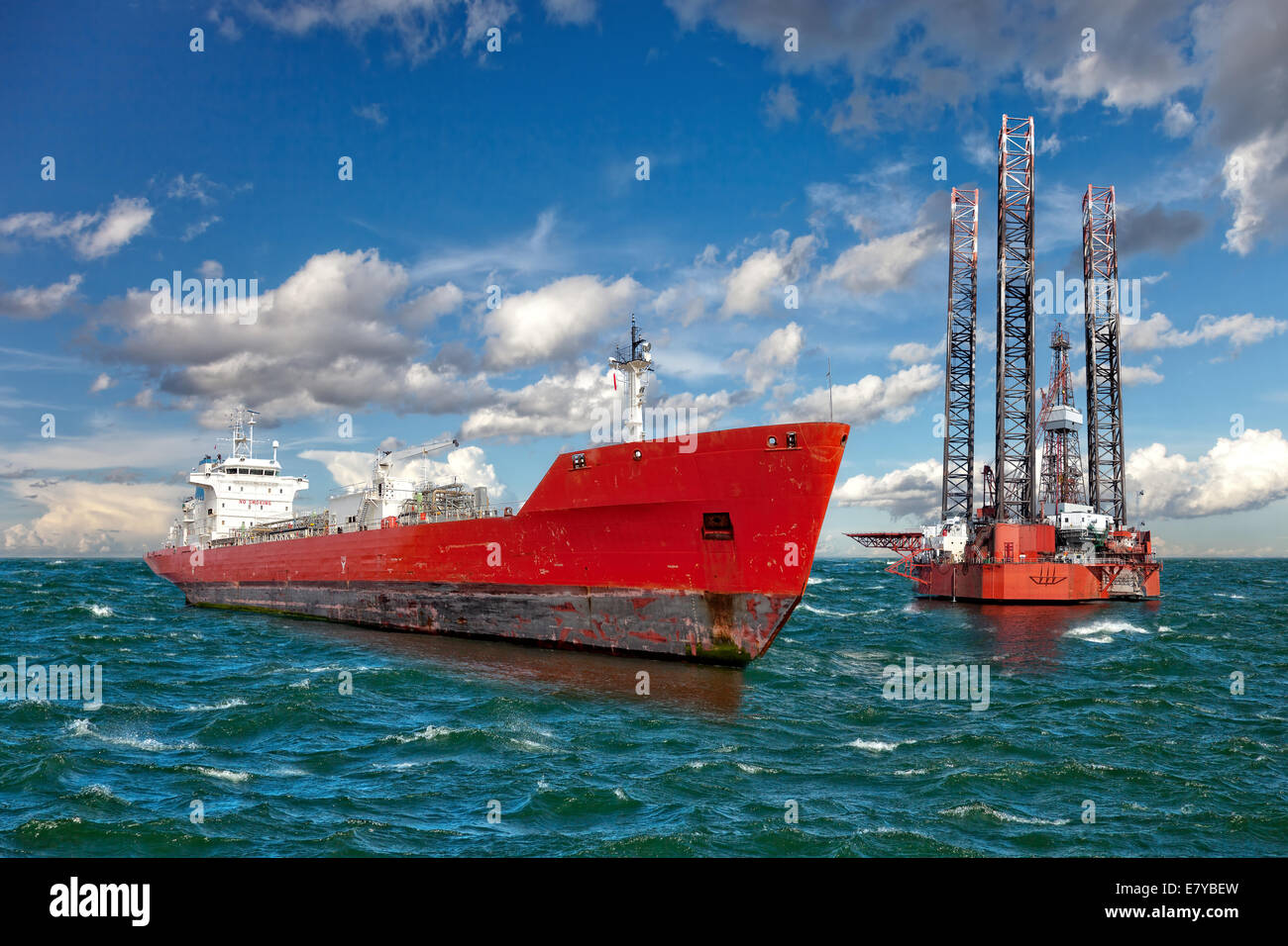 Oil rig and tanker ship on offshore area Stock Photo - Alamy