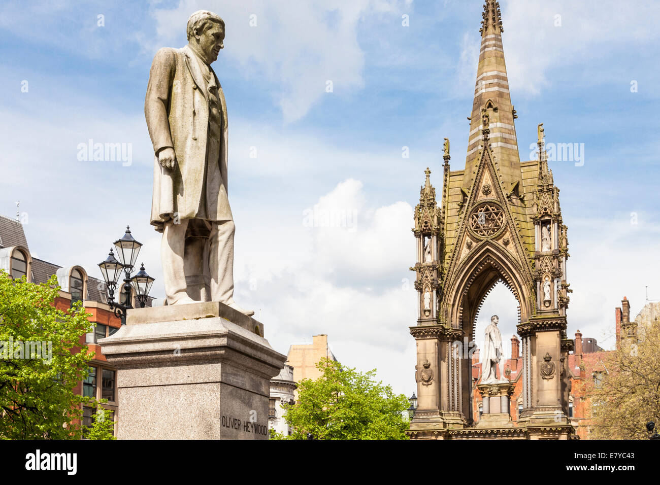 Statue of Oliver Heywood with the Albert Memorial in the background, Albert Square, Manchester, England, UK Stock Photo