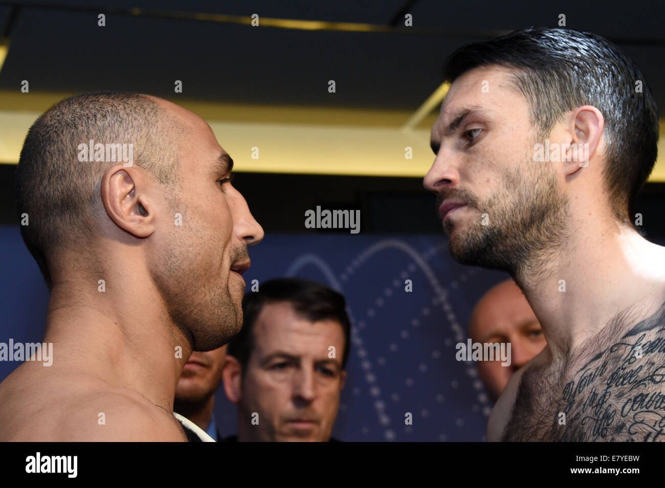 Professional boxers Arthur Abraham (L) and Paul Smith pose after the  official weigh-in inm Kiel, Germany, 26 September 2014. Abraham will meet  British boxer Smith during the WBO super-middleweight fight on 27