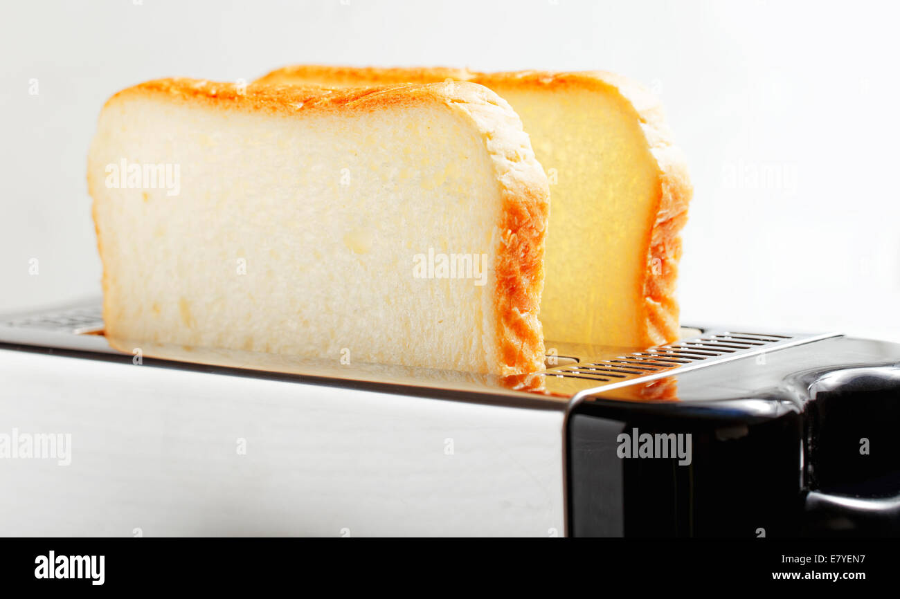 Toaster with bread slices close up photo Stock Photo Alamy