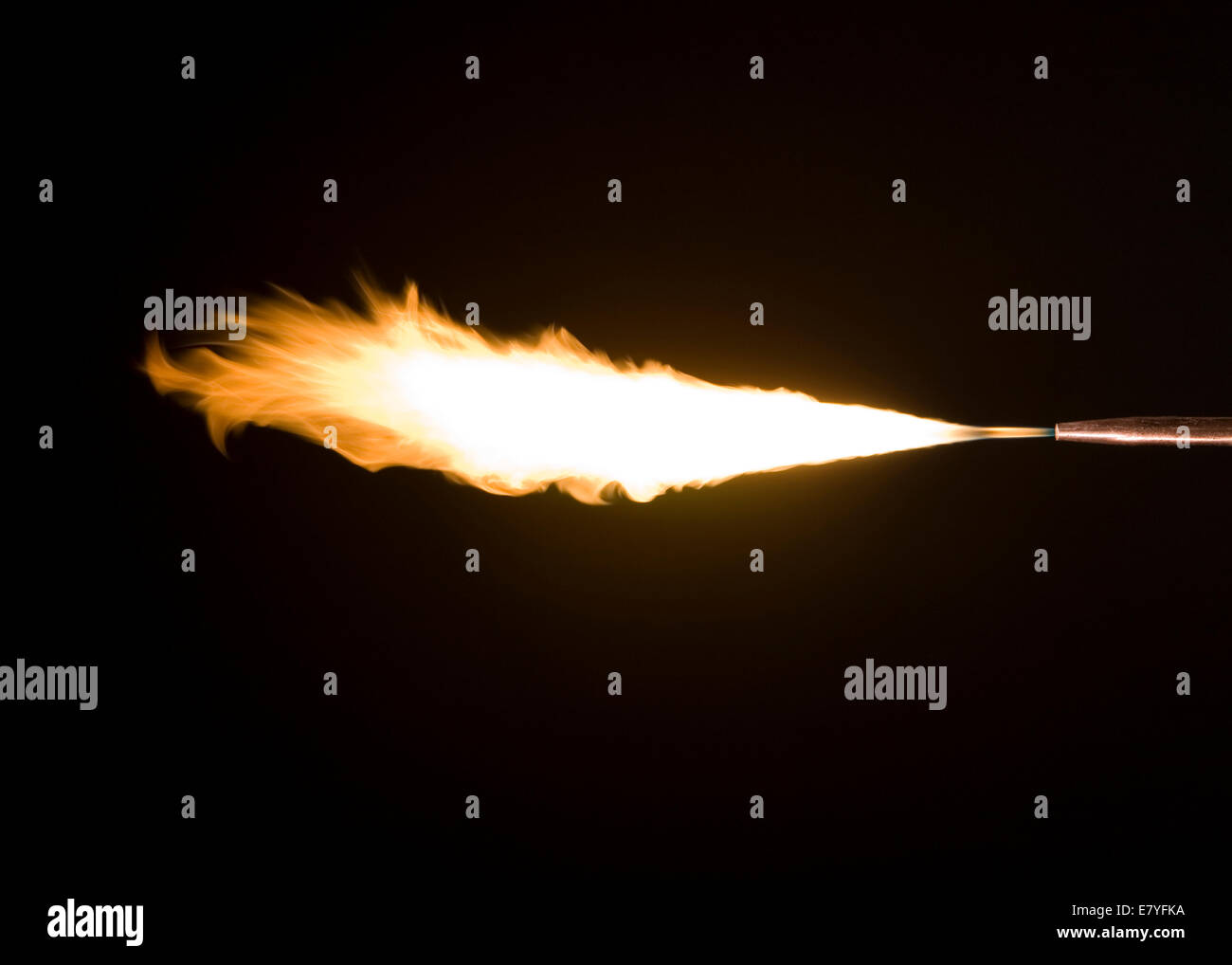 Acetylene from a welding tip burning in air Stock Photo
