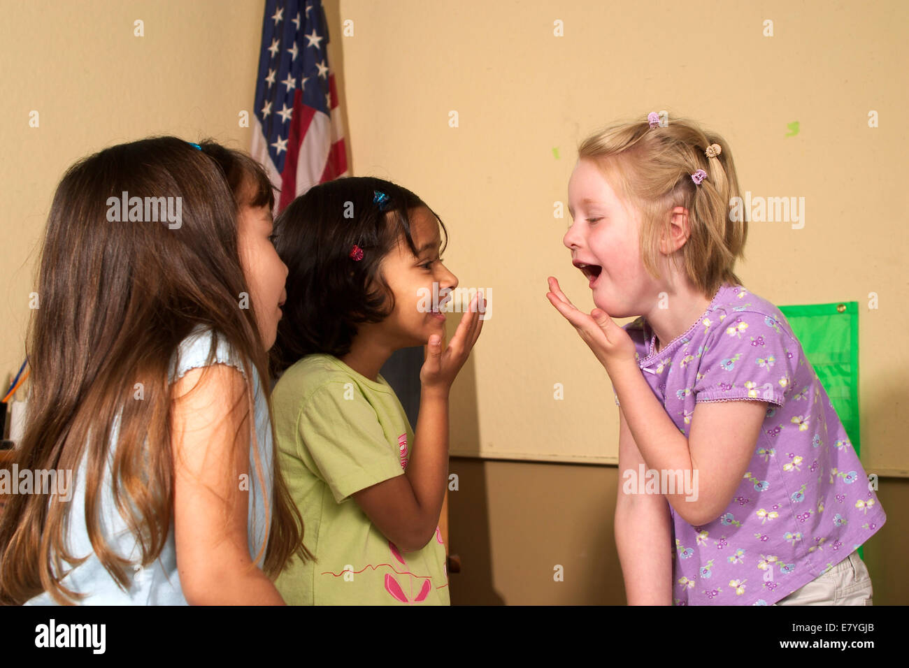 Interracial inter multi ethnic multi racial diversity racially diverse multicultural cultural ethnicity group classroom children having fun playing play Stock Photo