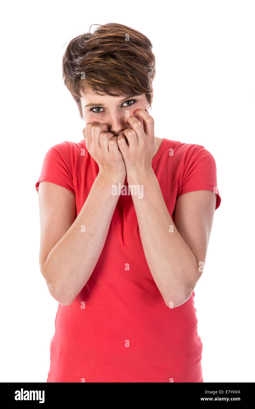 Young woman is afraid with hands before her face isloated over white background Stock Photo