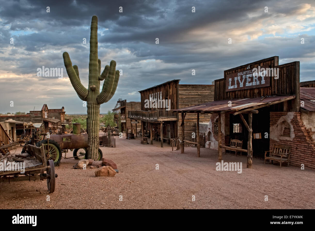 Storm clouds loom over a reconstructed ghost town in Goldfield, Arizona Stock Photo