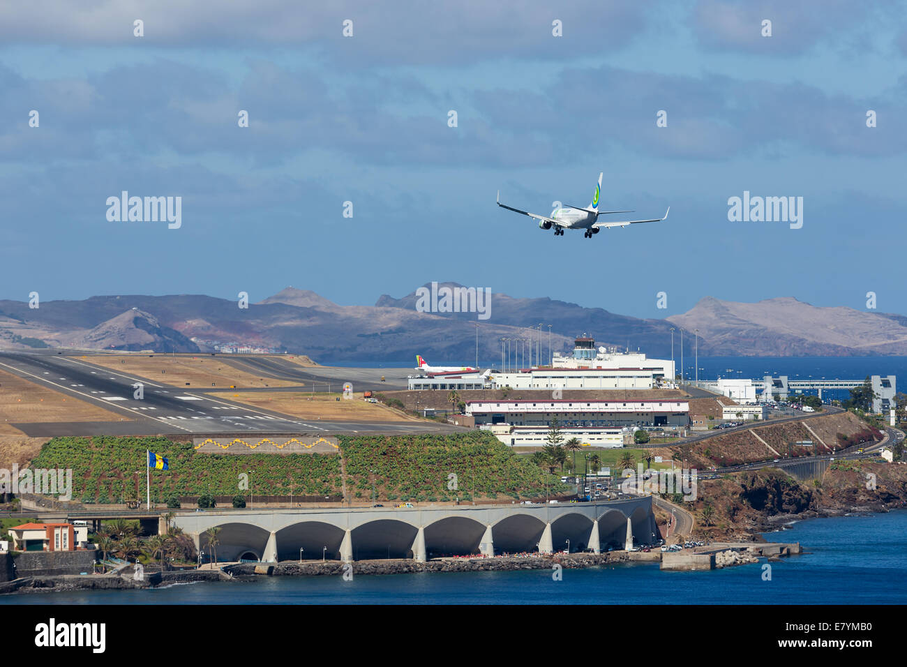 Boeing 737 is approaching Funchal Airport at Madeira, Portugal Stock Photo