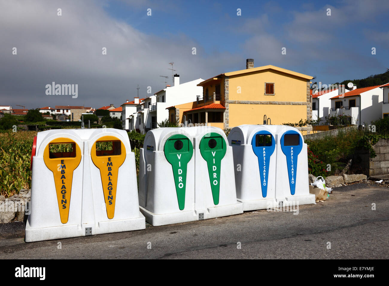 Recycling bins next to street in housing estate, Vila Praia de Ancora, northern Portugal Stock Photo