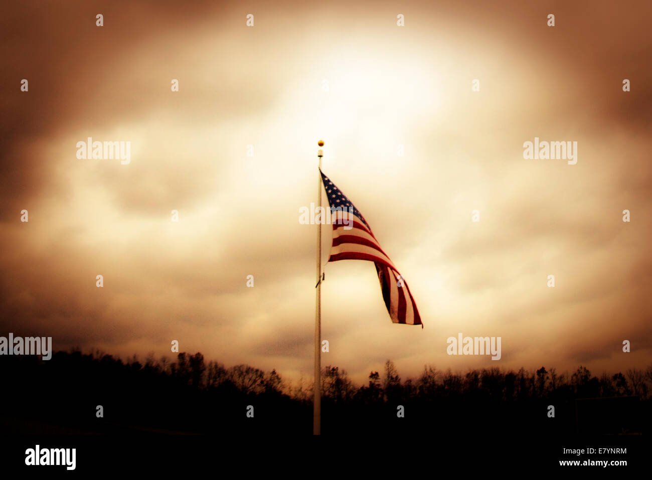 American flag with cloudy sky background Stock Photo - Alamy