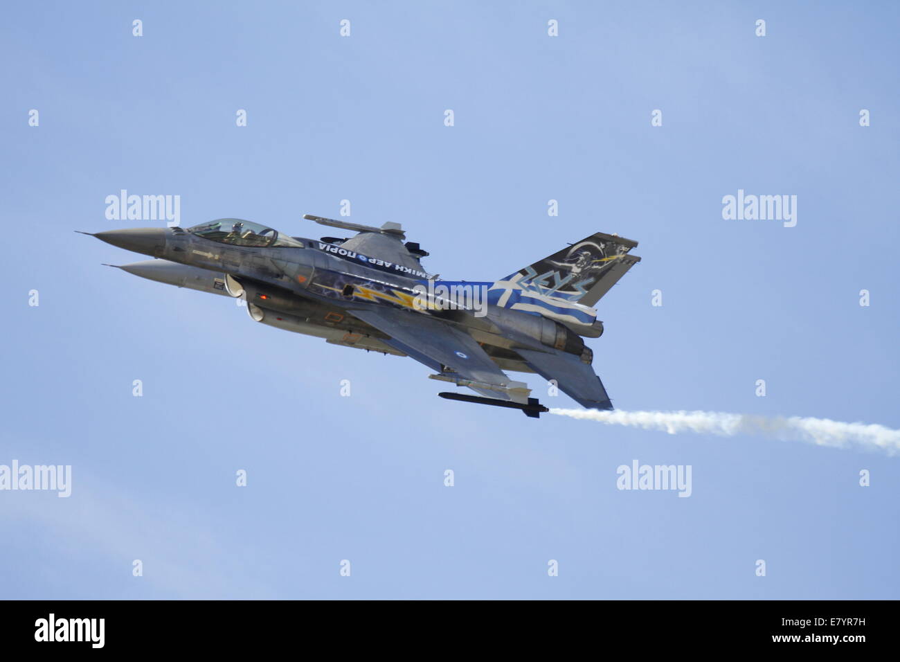 Acharnes, Greece. 26th September 2014. An Hellenic Air Force F-16 Block 52+ from the Demo Team Zeus (front) and a F-16AM from the Royal Netherlands Air Force (back) perform at the 2014 Tatoi Airshow. The Tatoi Air Show, the main public event of the 3rd Athens Flying Week 2014, started with a performance by acrobatic teams and demo teams from foreign Air Forces at Tatoi Airport near Athens in Greece. Credit:  Michael Debets/Alamy Live News Stock Photo