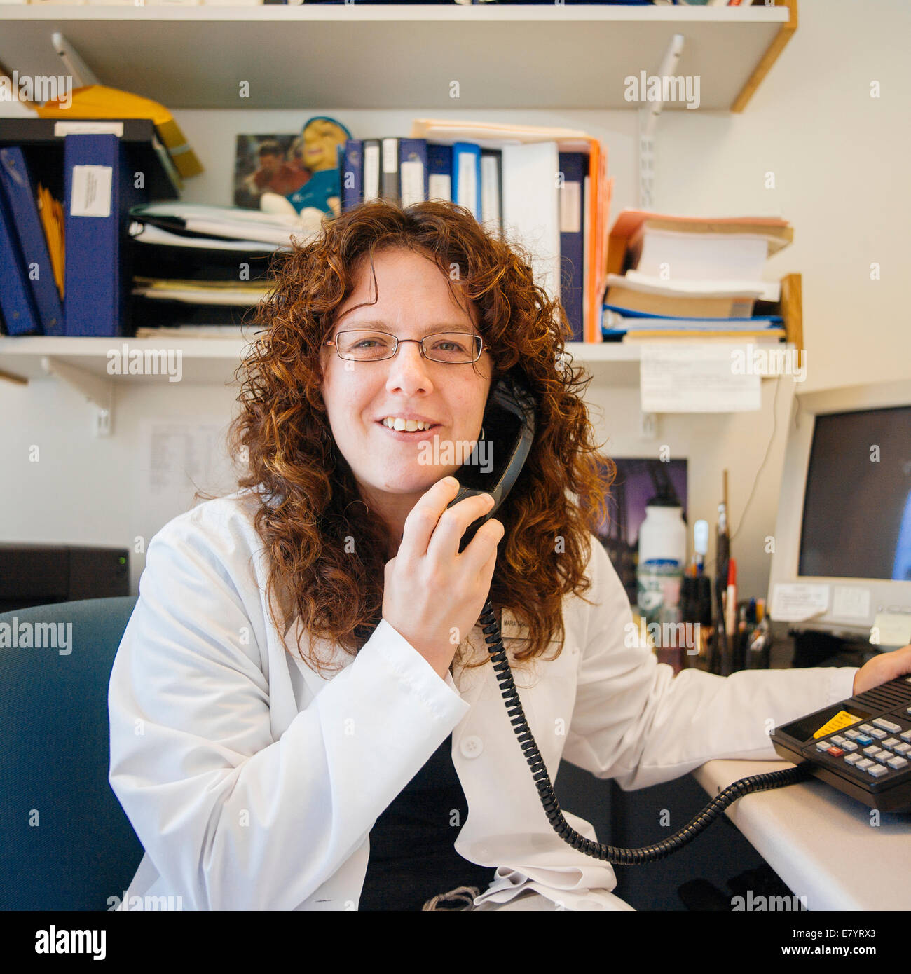 Portrait of female doctor in office Stock Photo
