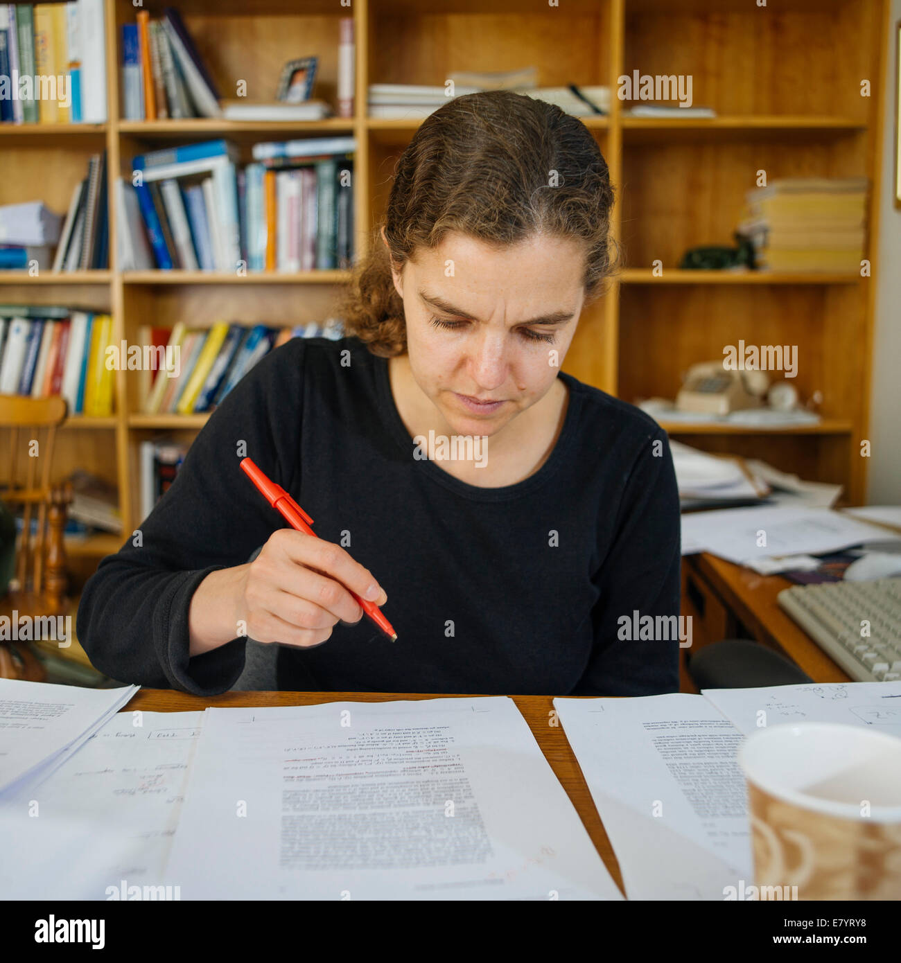 Portrait of woman working in office Stock Photo