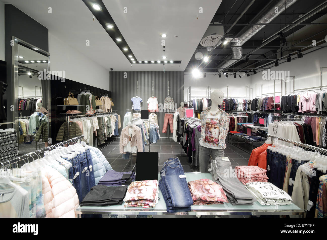 luxury and fashionable brand new interior of cloth store Stock Photo ...