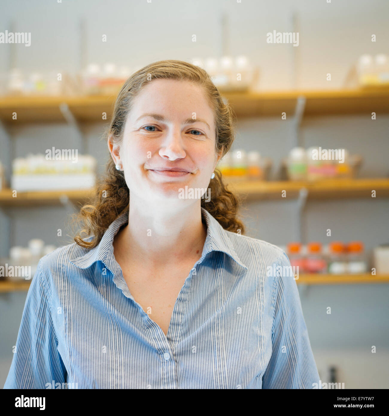 Portrait of mid-adult woman in laboratory Stock Photo
