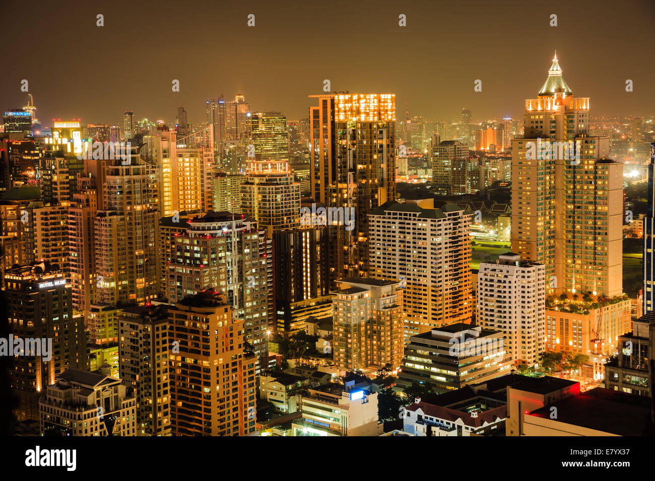 View of Bangkok skyline in the night. This picture was taken at the commercial center of Bangkok, Thailand. Stock Photo