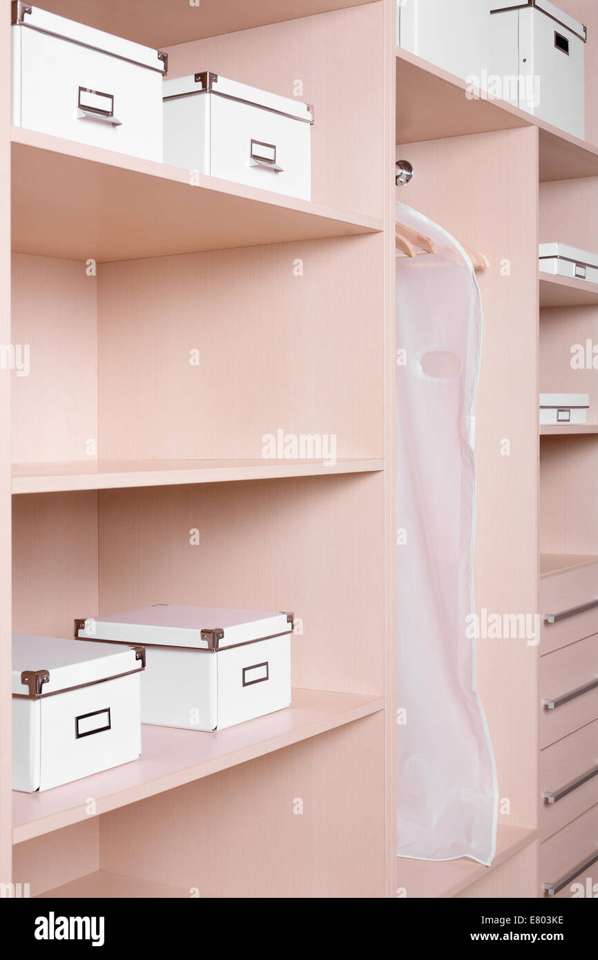 Modern And Stylish Interior Of Bright Wooden Wardrobe Stock