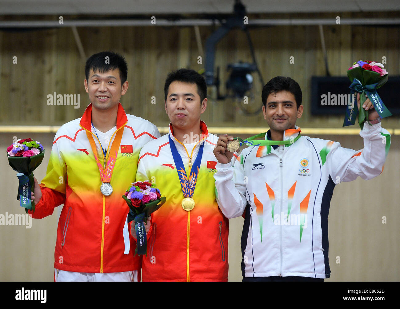 Incheon, South Korea. 27th Sep, 2014. Gold medalist Cao Yifei (C) of ...