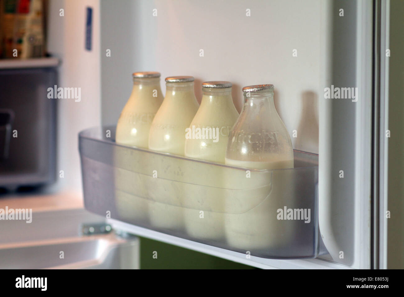 Dairy Crest milk bottles . . Peterborough, Cambridgeshire, UK . . 26.09.2014 Dairy Crest bottles of milk, as it is reported that Dairy Crest are stopping the manufacturing of glass milk bottles. Pic: Paul Marriott Photography Stock Photo