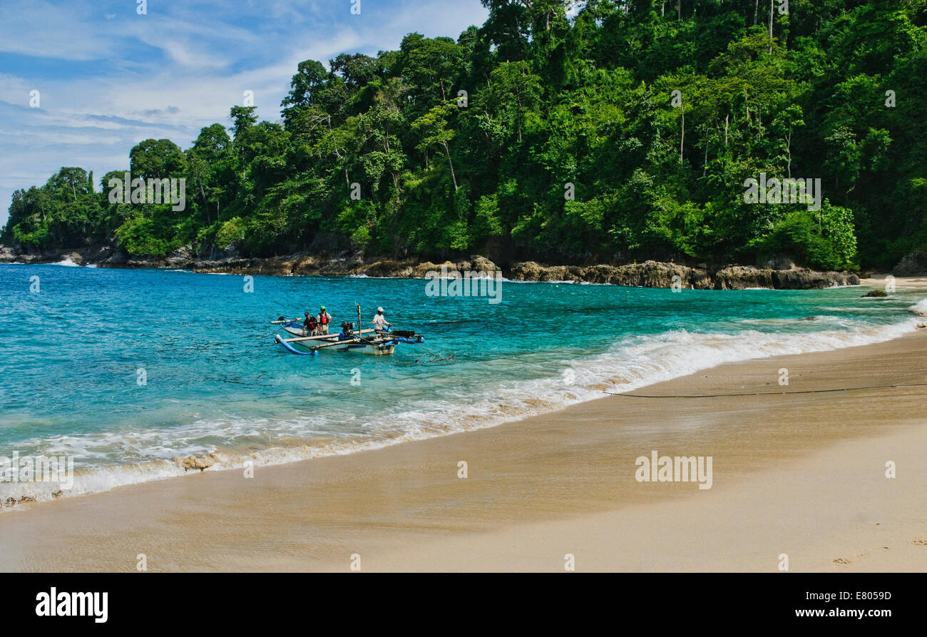 Fisherman At The Beautiful Teluk Hijau Green Bay Beach In