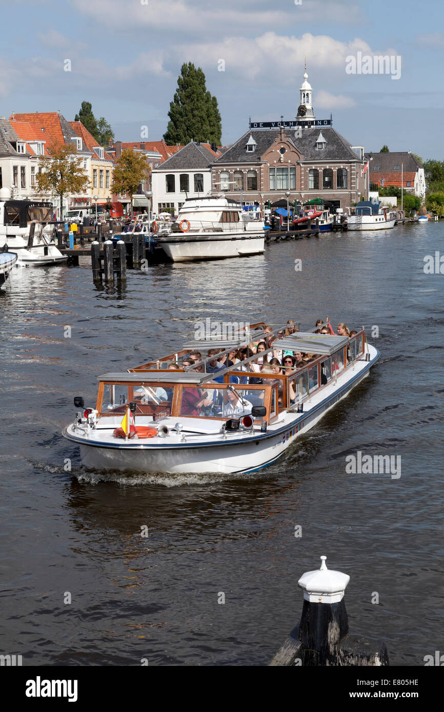 Canal boat in the old harbour of Leiden, Netherlands Stock Photo