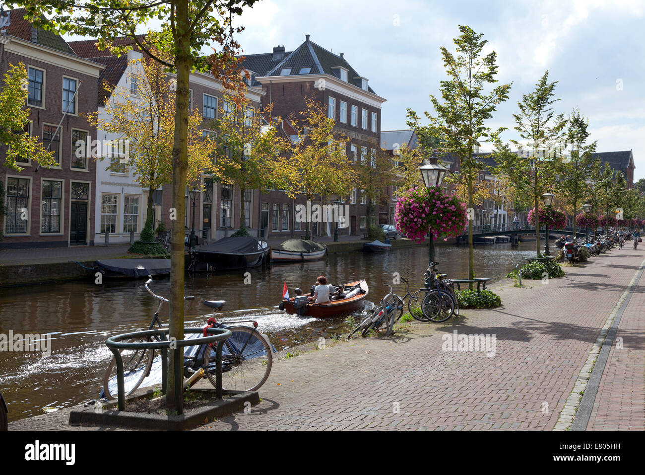 Recreatio boat in canal on Oude Rijn, Leiden, Netherlands Stock Photo