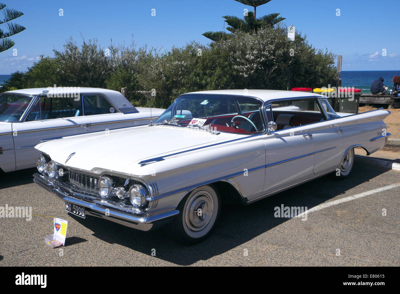 Newport Beach, Sydney, Australia. 27th Sep, 2014. Classic cars on display at Sydney's Newport Beach, white oldsmobile featured. Credit:  martin berry/Alamy Live News Stock Photo