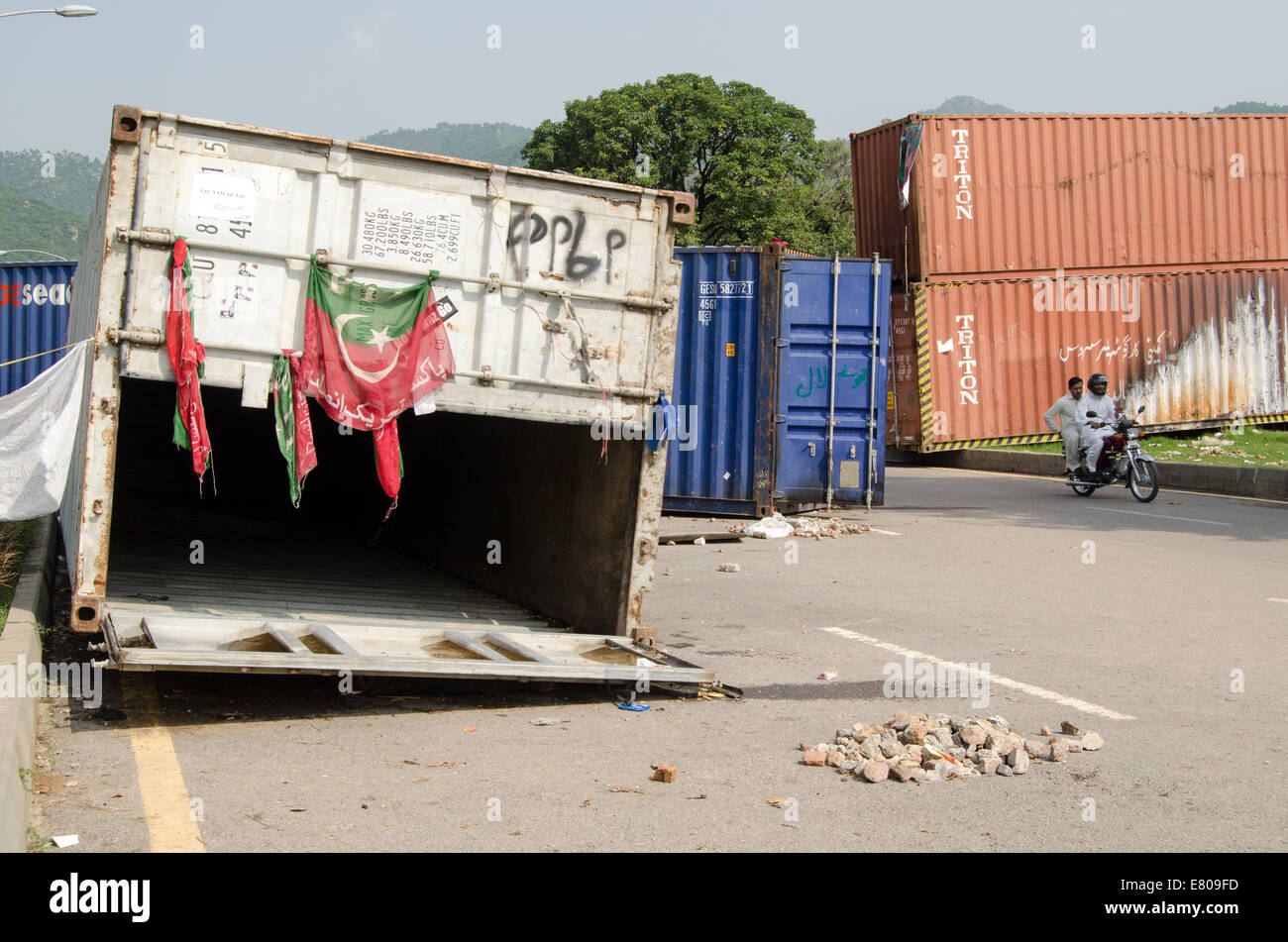 ISLAMABAD, PAKISTAN  SEPTEMBER 24, 2014:  Shipping containers being used by anti-government protesters in Islamabad. Stock Photo