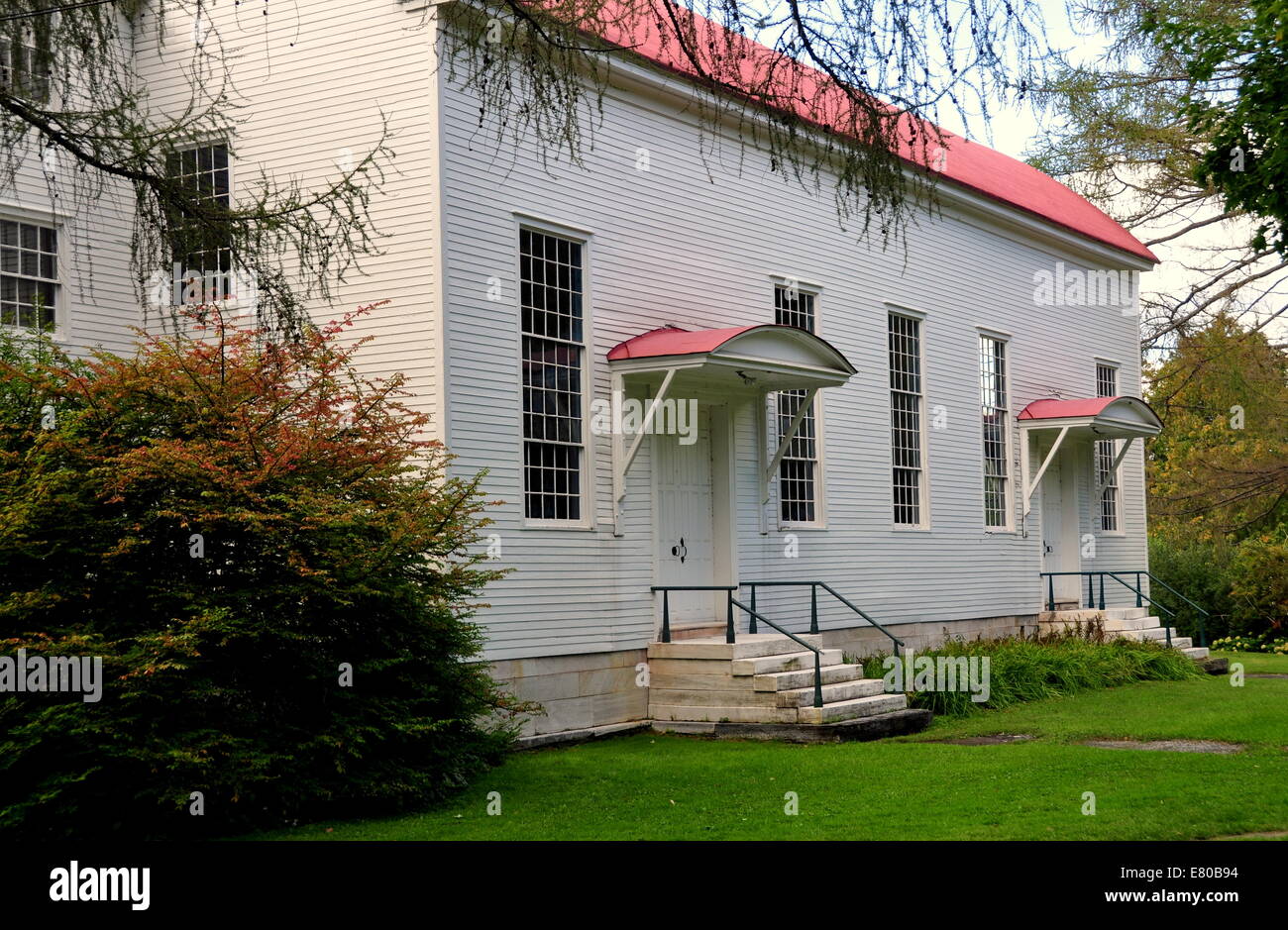 New Lebanon, New York:  Early 19th century Shaker Meeting House with its dual covered entrance doorways Stock Photo