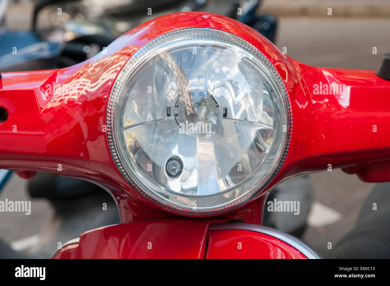 Color red motorcycle parked on the street Stock Photo