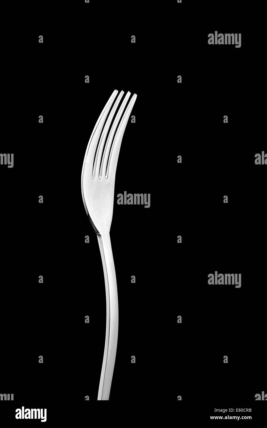 Stainless fork on black background with copy space. isolated with clipping path Stock Photo