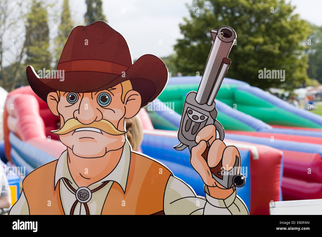 Cardboard cutout cowboy with a Gun Stock Photo Alamy