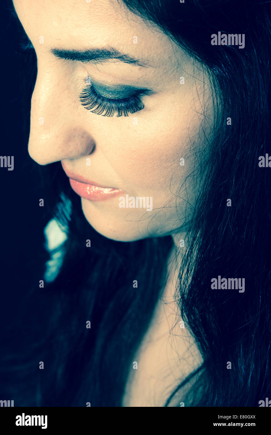 Close up of a woman with long eyelashes Stock Photo