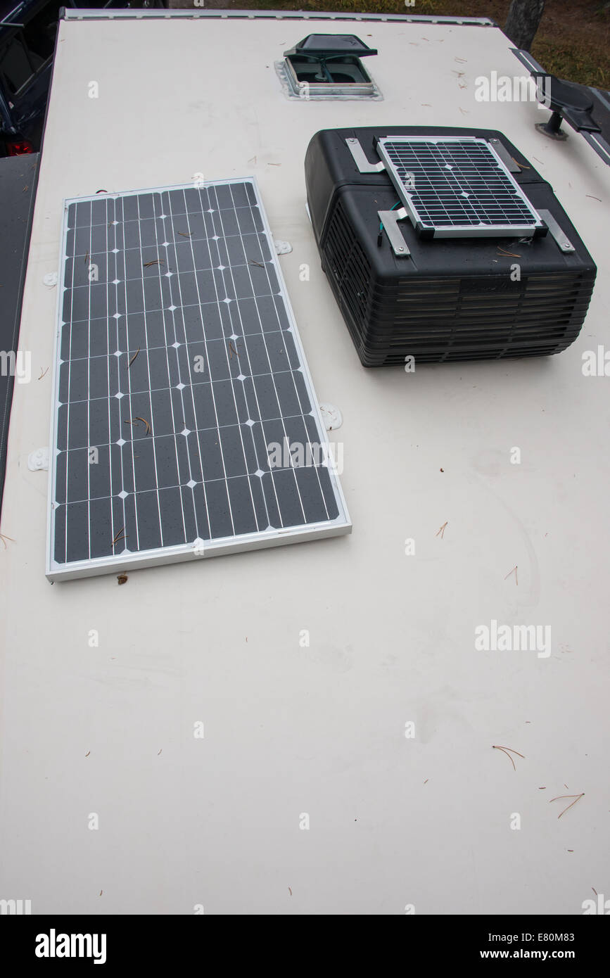 Solar panels on the top of a travel trailer.  The panels are used to charge the trailer batteries. Stock Photo